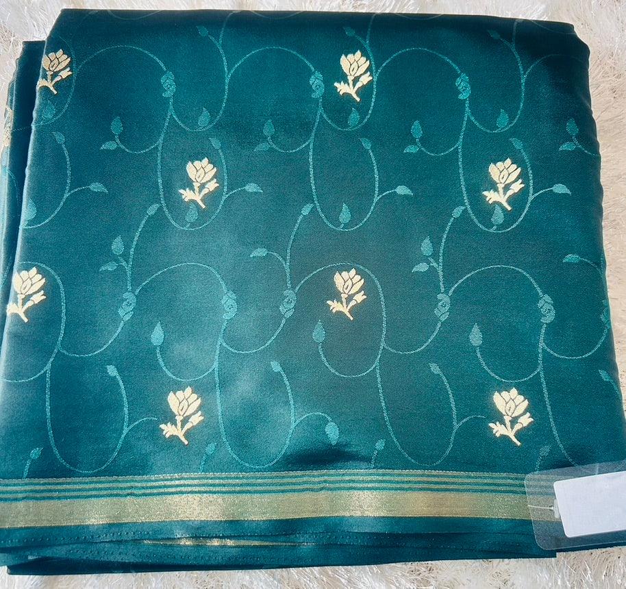Softt Silk Green embossed saree - praasam
