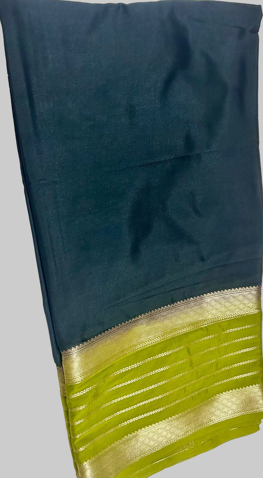 BOTTLE GREEN SEMI SILK SAREE