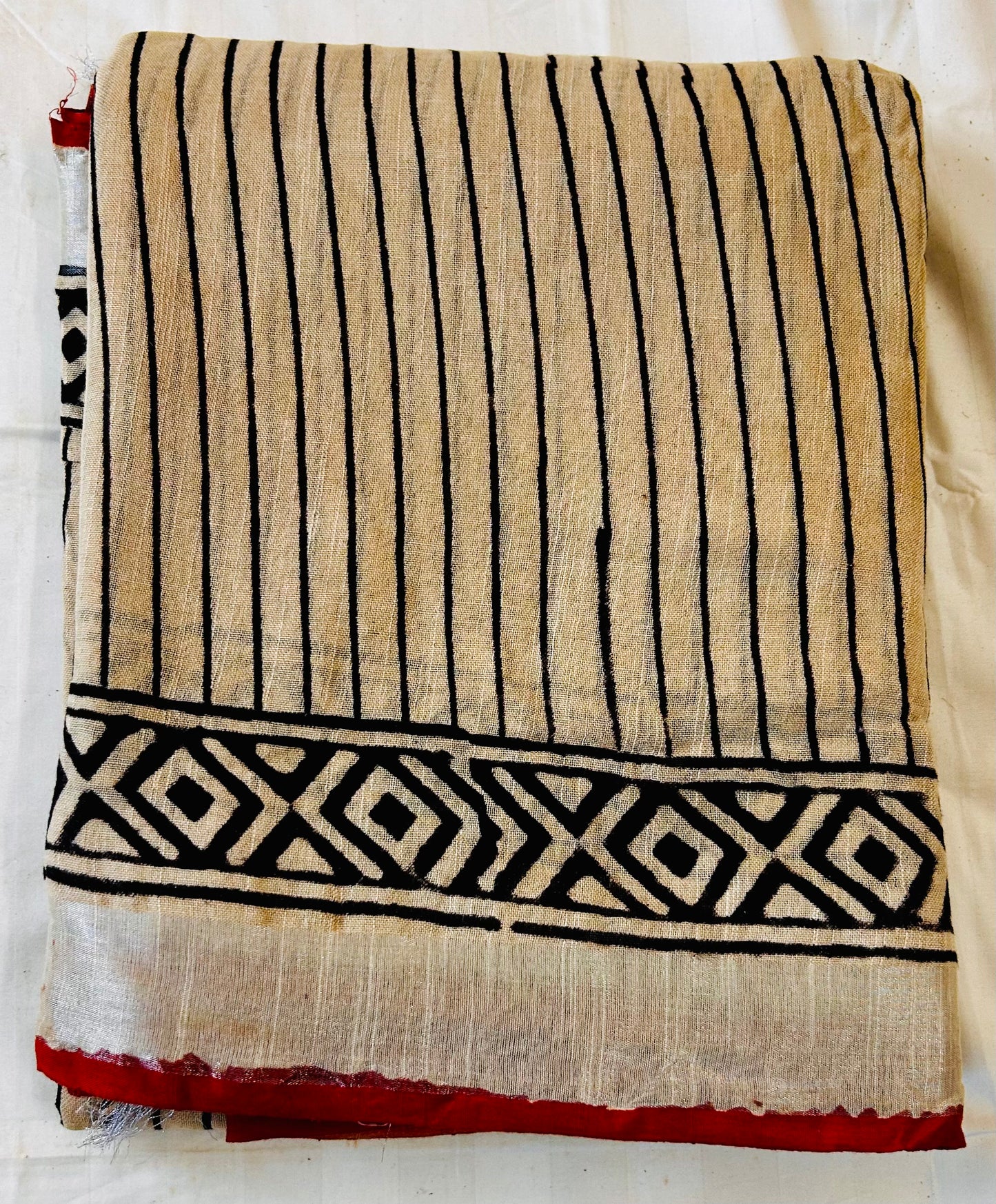 Beige with black and brick red handblock printed linen saree